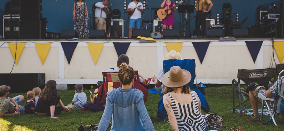 couple in front of banner